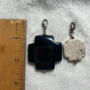 Black and white our crackel stone pendants. White has broken hook but works
